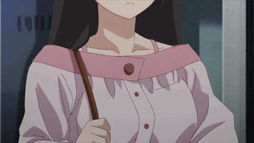 a girl in a pink off the shoulder shirt holds a brown stick