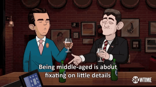 a showtime advertisement shows two men having a drink