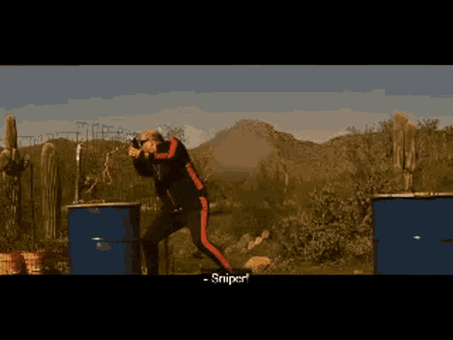 a man is holding a gun in front of a blue barrel and the word sniper is on the bottom