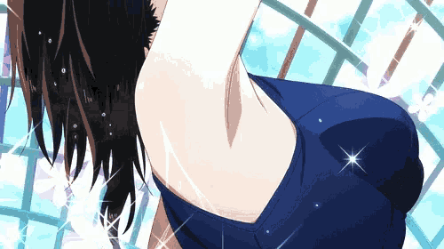 the back of a girl in a blue swimsuit