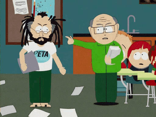 a man wearing a shirt that says peta is standing next to another man