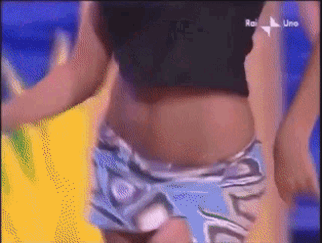 a woman 's stomach is shown on a rai uno television screen
