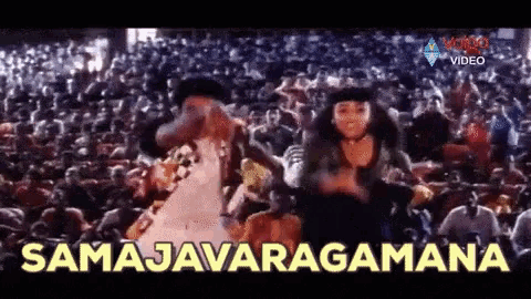 a group of people are dancing in front of a crowd and the words samajavaragamana are visible