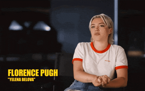 a woman sitting in a chair with the name florence pugh above her