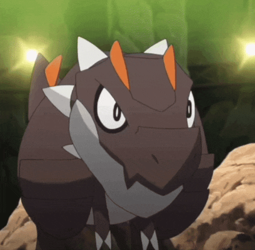 a cartoon drawing of a dinosaur with orange horns and a white head
