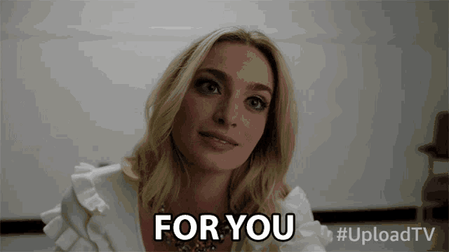 a woman says " for you " in front of a white background
