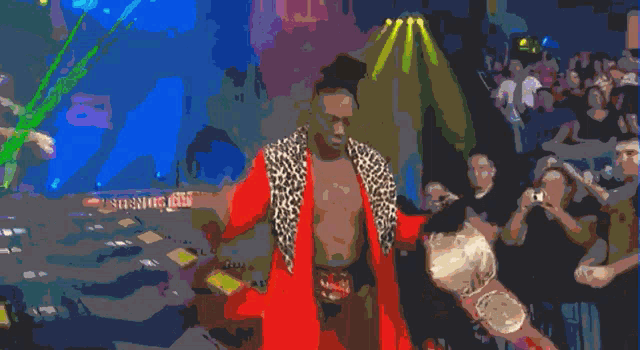 a man in a leopard print jacket stands in front of a sign that says " championship "