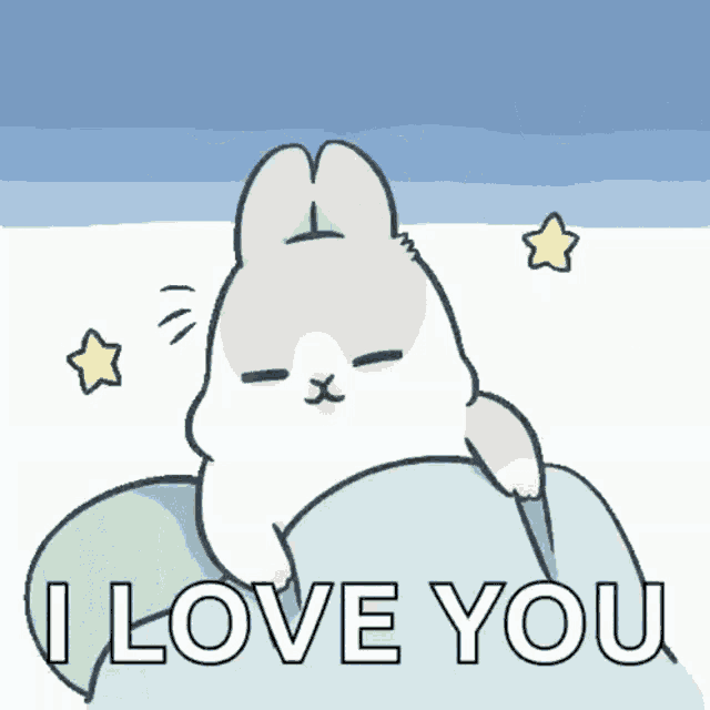 a cartoon rabbit is laying on a pillow and saying i love you