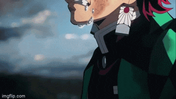 a close up of a person 's face with tears coming out of it