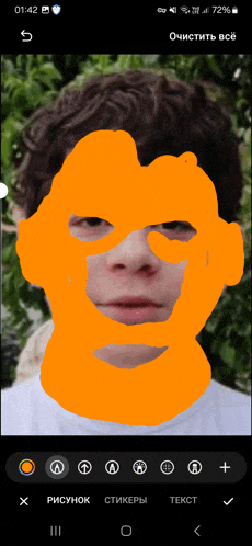 a phone screen shows a drawing of a man 's face with orange spots on it