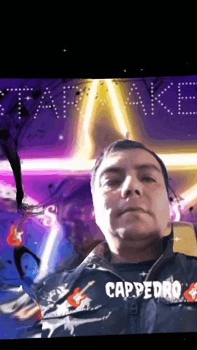 a man wearing a cappedro jacket is taking a selfie