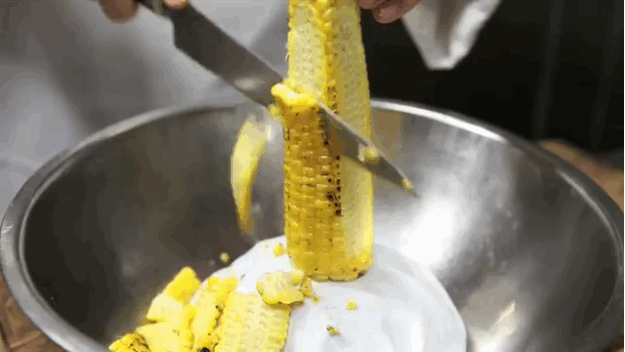 11. Then Use Two Bowls (A Smaller One Inside A Larger One) To Cut Corn Off The Cob. GIF - Corn Cob Hack GIFs