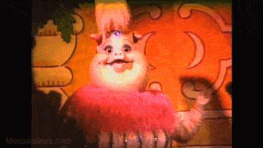 a close up of a cartoon character with mousesteps.com written on the bottom of the screen