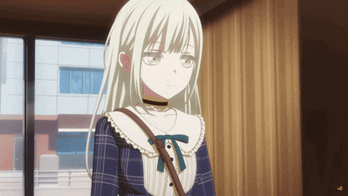 a girl with long blonde hair is wearing a blue plaid top