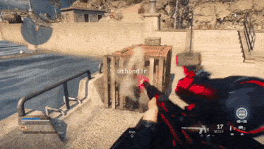 a person is holding a gun in a video game with the name @thund3r on the screen
