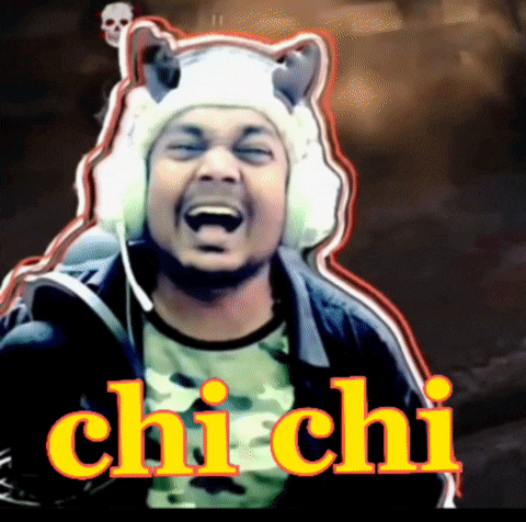 a man wearing a cat hat and ear muffs says " chi chi " in yellow