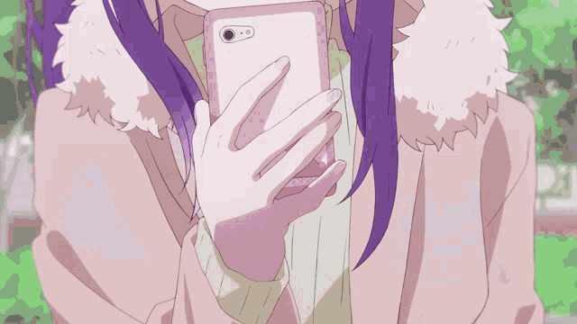 a girl with purple hair is holding a pink phone in her hand