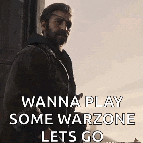 a man with a beard is holding a gun and saying wanna play some warzone lets go .