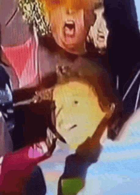 a close up of a person 's face with a cartoon face on it