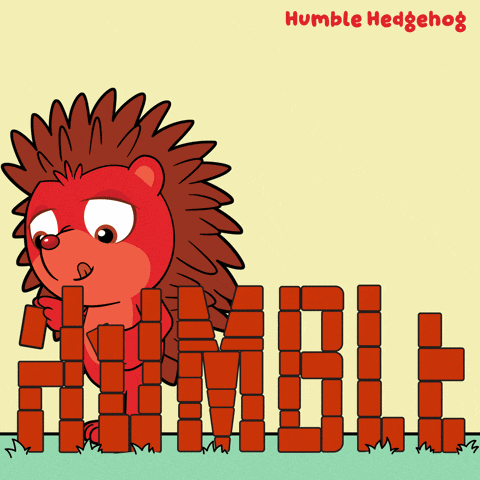 a cartoon of a hedgehog holding bricks that spell out the word humble