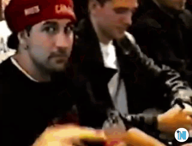 a man wearing a red hat that says canada