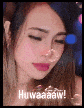 a close up of a woman 's face with the caption " huwaaaw "