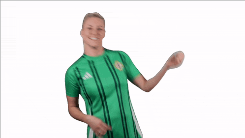 a woman wearing a green adidas shirt is smiling