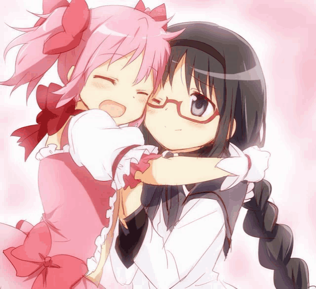 two anime girls are hugging each other and one has glasses on