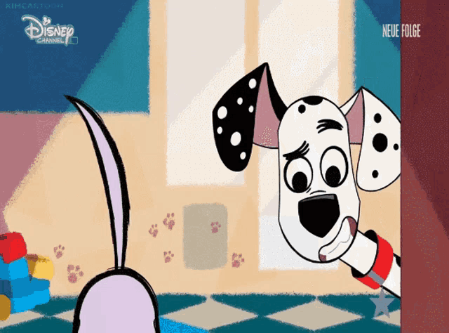 a dalmatian dog is looking at a rabbit with a disney channel logo behind it