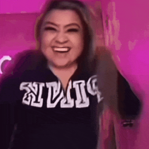 a woman wearing a black shirt with the word always on it