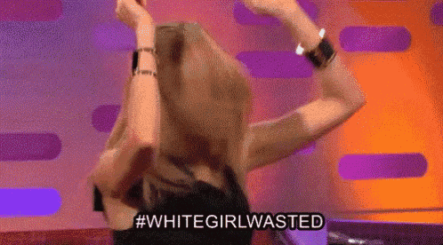 a woman is dancing on a stage with her arms in the air and the words `` white girl wasted '' written on the bottom .