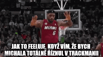 a basketball player in a red jersey with the number 6 on it is celebrating a basket .