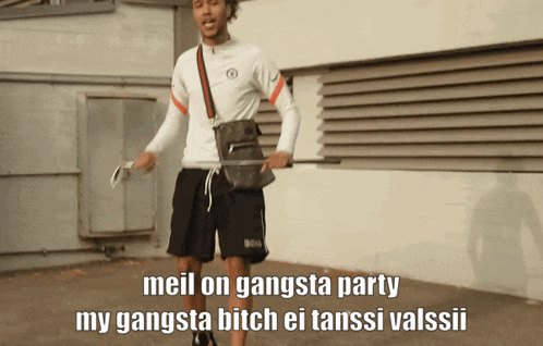 a man in a white shirt and black shorts says " mail on gangsta party my gangsta bitch ei tansi valssii "