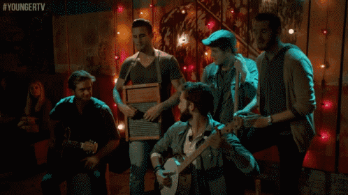 a group of men playing musical instruments with the hashtag youngertv