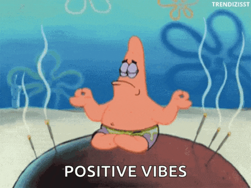 patrick star from spongebob sits in a lotus position with the words positive vibes behind him