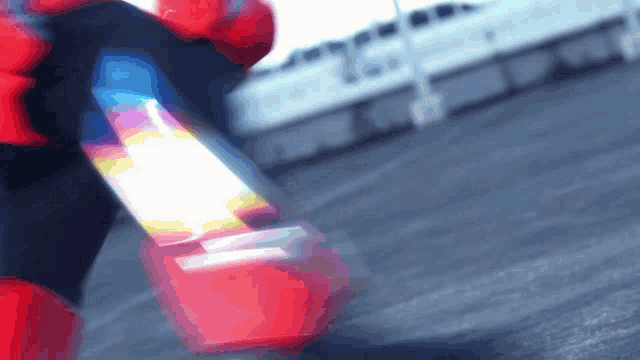 a blurred image of a person holding a cone