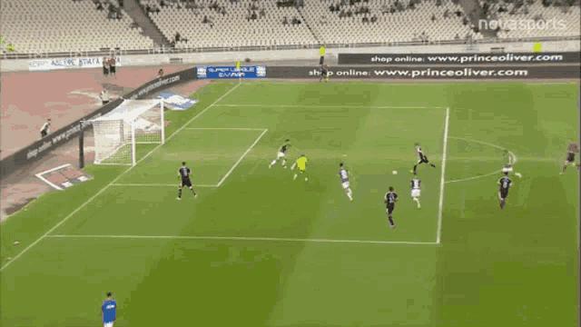 a soccer game is being played in a stadium sponsored by nova sports