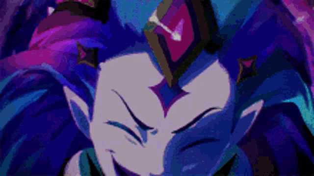 a close up of a person 's face with a crown on their head .