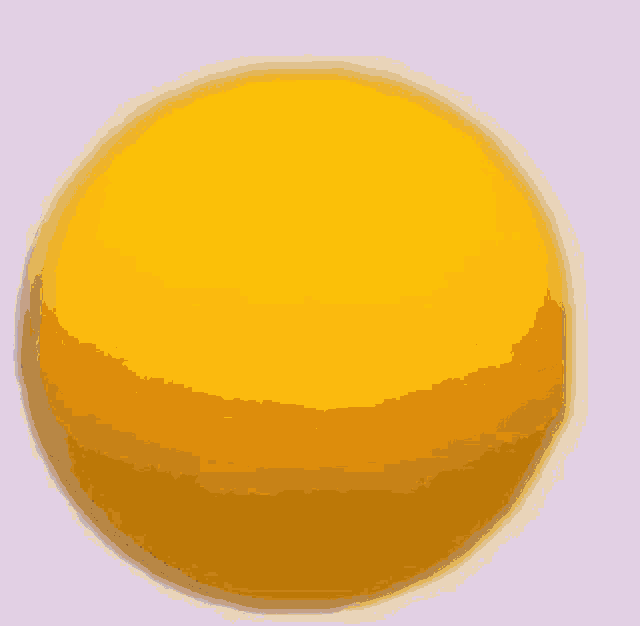 a yellow smiley face with a purple mouth