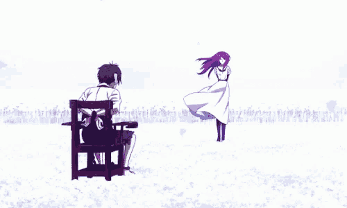 a man is sitting in a chair and a woman is walking towards him