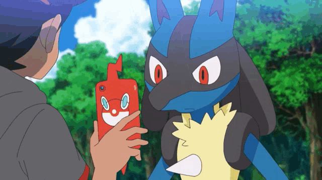 a cartoon character is holding a red item with a smile on it