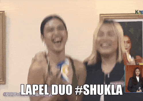 two women are laughing with the words lapel duo #shulka above them