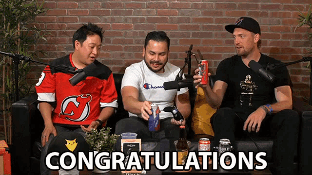 a group of men sitting on a couch with the words congratulations in the corner