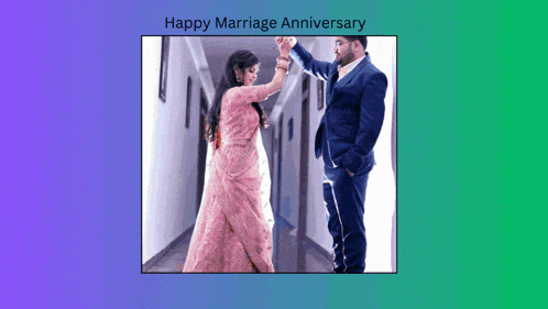 a man and a woman are standing in a hallway holding hands .