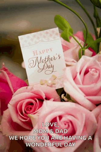 a bouquet of pink roses with a mother 's day card