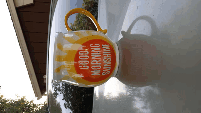 a pitcher that says " good morning sunshine " on it
