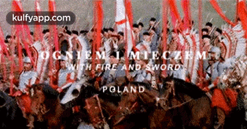 a group of soldiers are standing in front of a banner that says poland