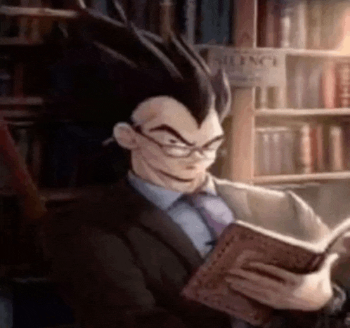 a man in a suit and tie is reading a book .