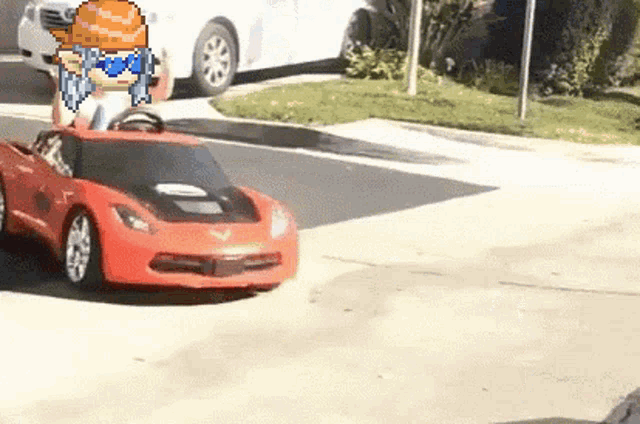 a pixel art of a man driving a red sports car on a street .