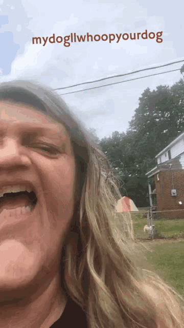 a woman is making a funny face with the caption mydogllwhoopyyourdog
